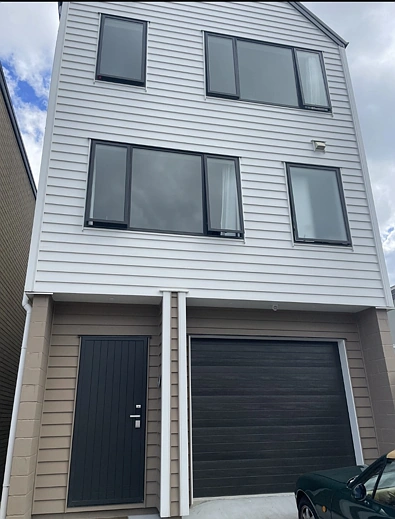 Spacious 4 Bedroom 3 Bathroom House with Deck and Garage in Westgate, Auckland