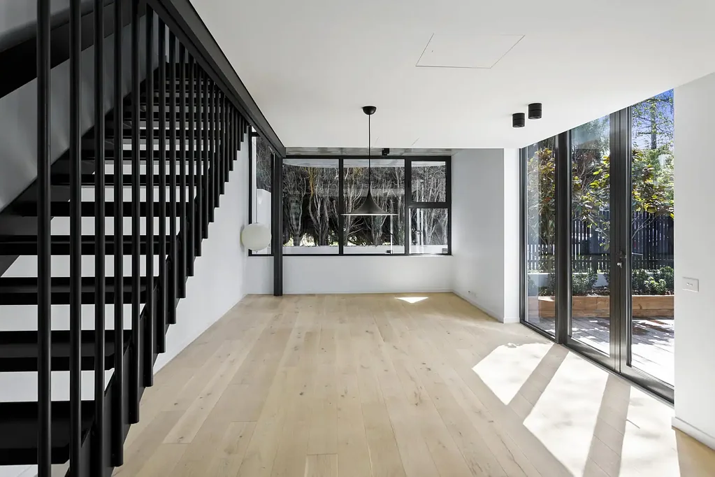 Near-New Designer Townhouse in Coveted Elwood Locale