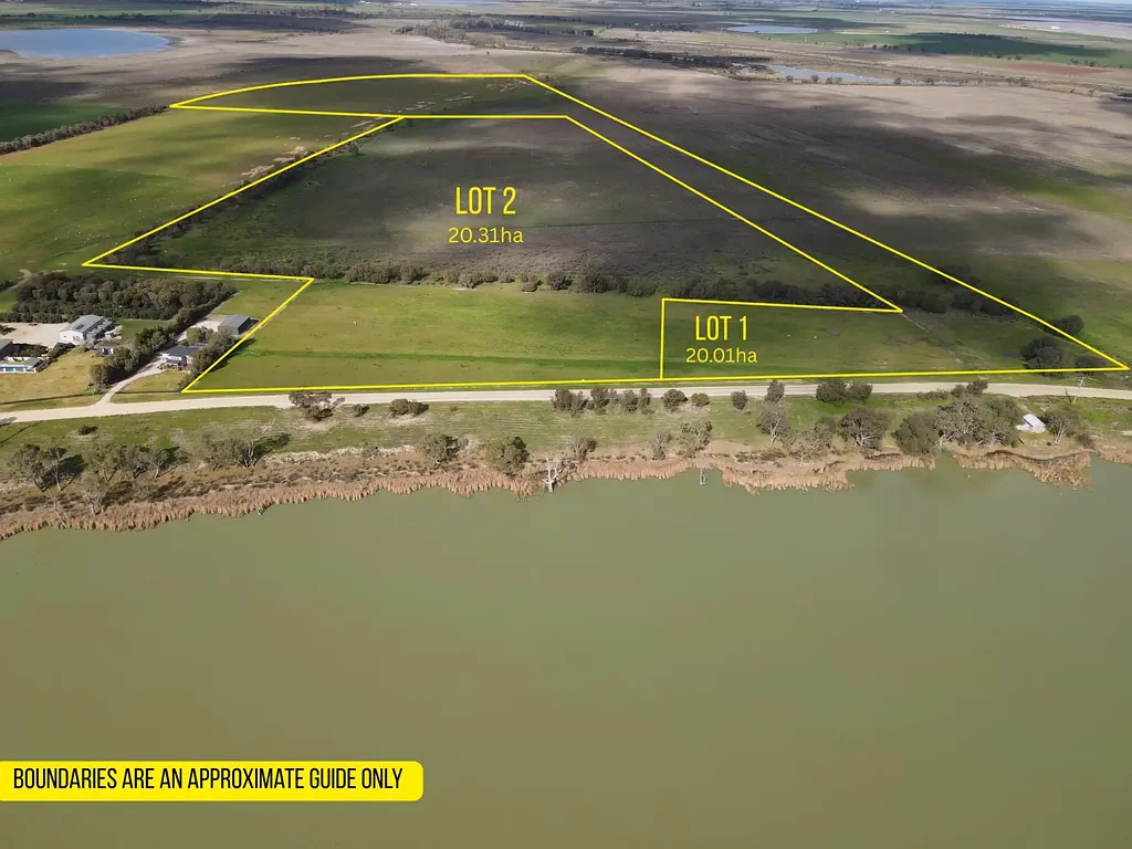 Lake Charm  A Rare Lakeside Opportunity with Stunning Elevated Views