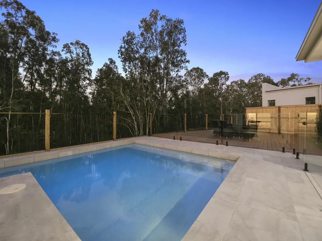 MODERN FAMILY LIVING WITH POOLSIDE ENTERTAINING IN A PRIME COOMERA LOCATION
