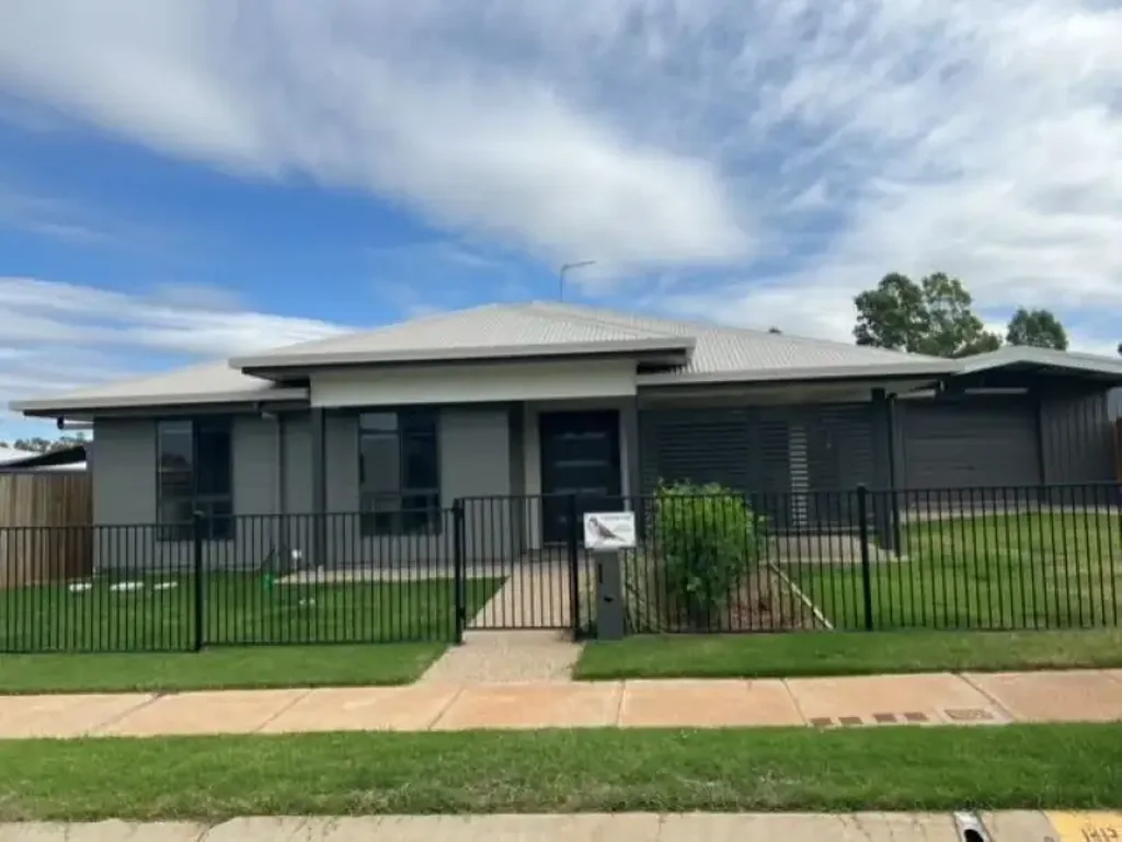 Moranbah 4 Bedroom Spacious Family Home with Versatile Living Spaces and Laneway Access