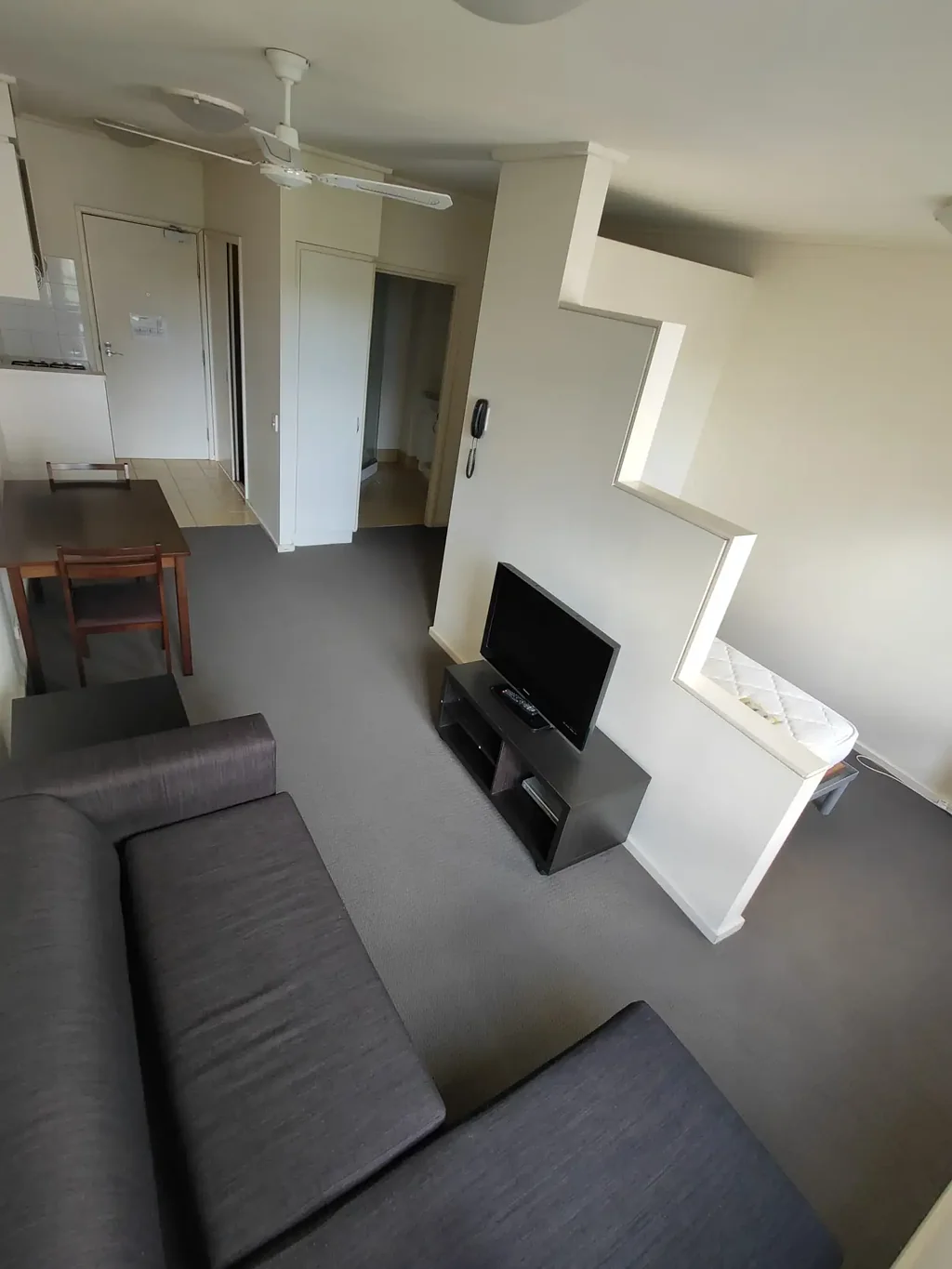 Stylish Furnished Apartment with Pool View – Walk to Uni & Lygon Street