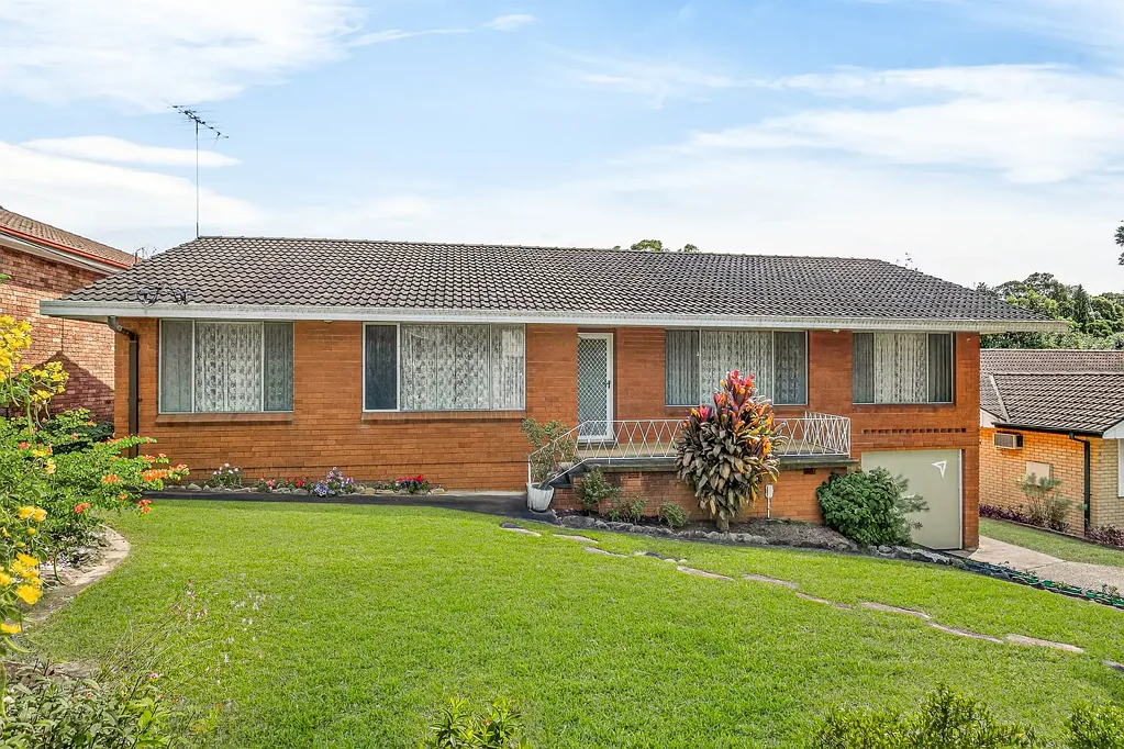 Telopea 3Moenga Classic brick home on a wide parcel in a tightly held Telopea pocket