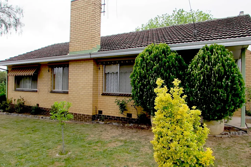 Classic Cream Brick Home Close to Town