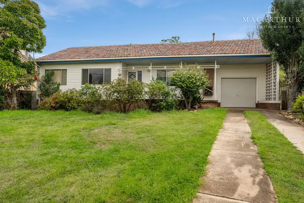 Inviting Family Home with Spacious Yard in Peaceful Kooringal Cul-de-Sac