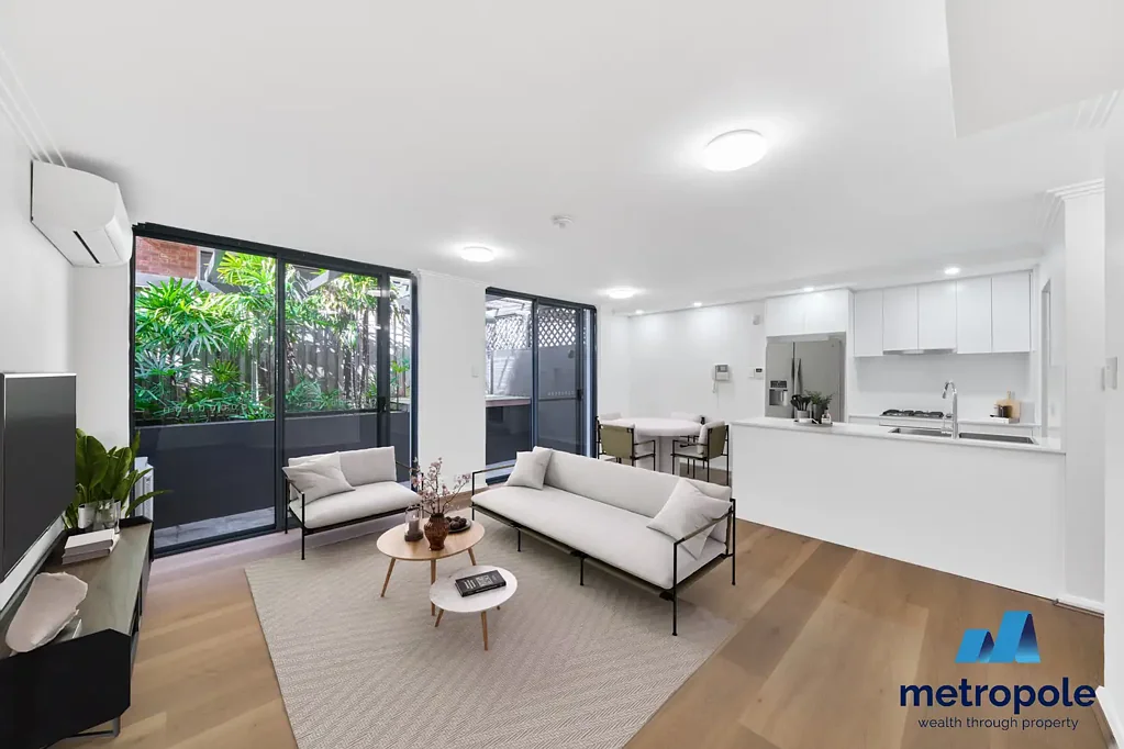 NEWLY RENOVATED SPLIT LEVEL TWO BEDROOM APARTMENT WITH COURTYARD AND SECURE PARKING