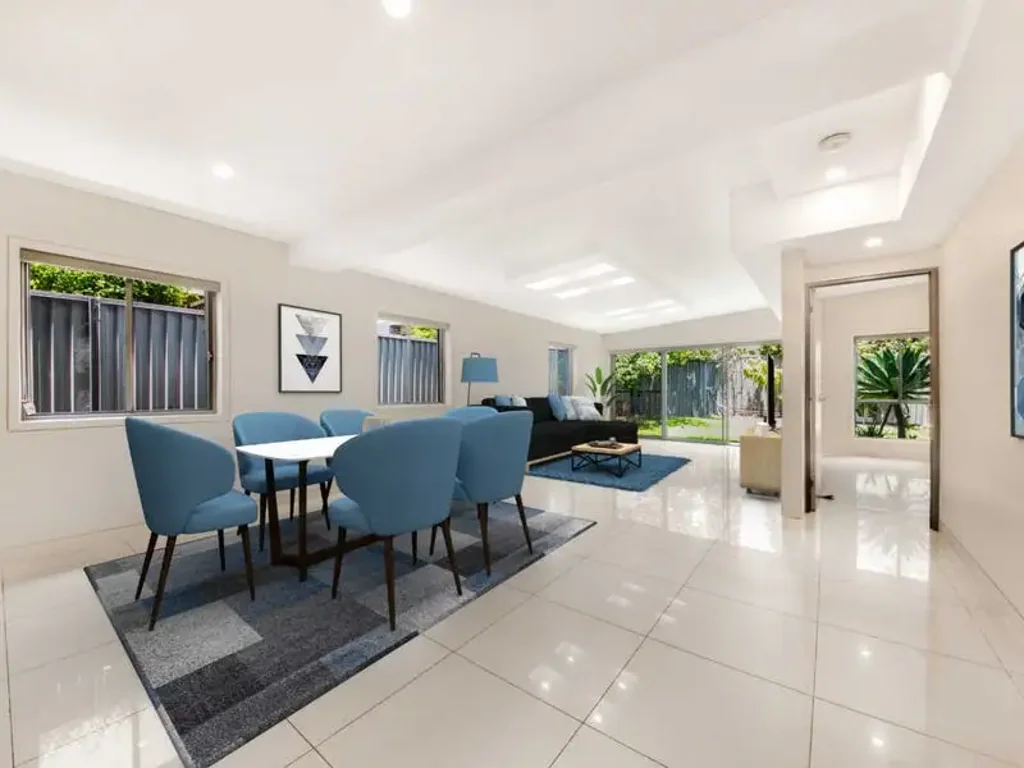 Luxury Living in This Beautiful Five Bedroom Duplex!
