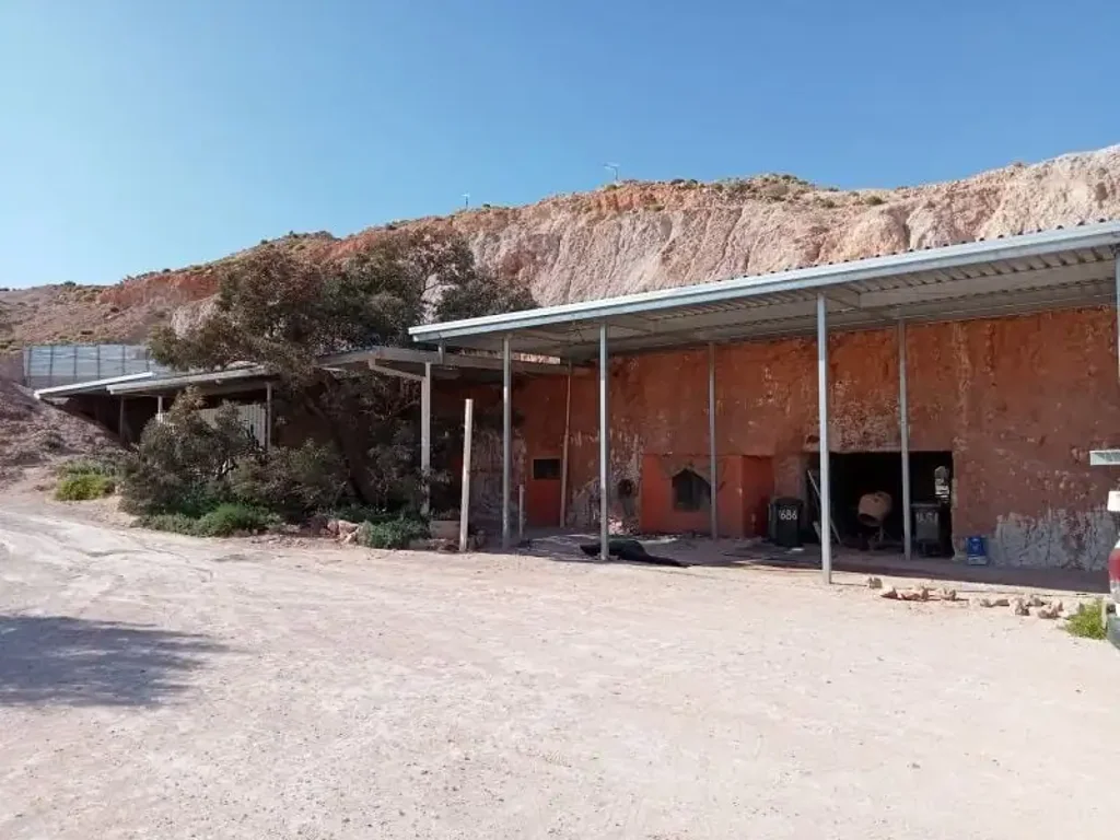 Coober Pedy 3 Bedroom Charming Hillside Dugout with Expansive Patio on Freehold Block