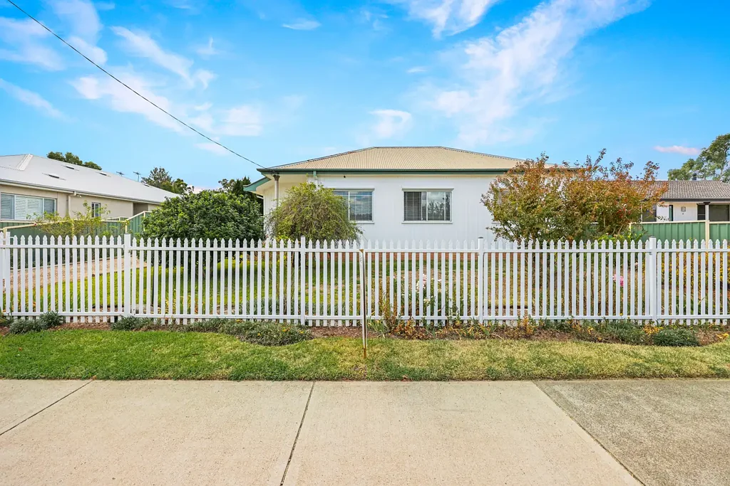 Freshly Updated Four-Bedroom Home with Expansive Shed Space