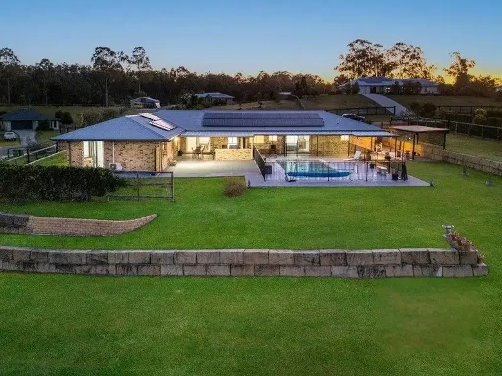 Exceptional Dual-Living Acreage Property With A Pool