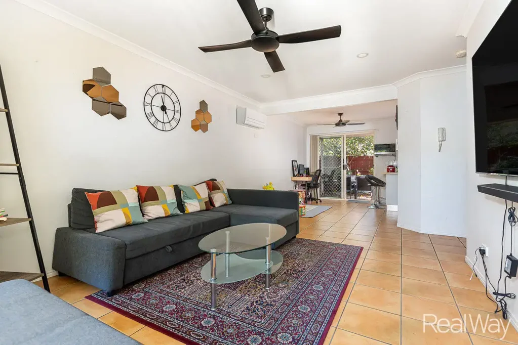 Centrally located, in a secure gated townhouse complex