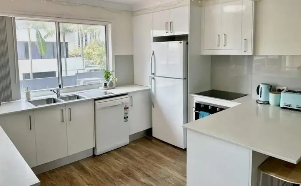 THREE-BEDROOM TOWNHOUSE IN THE HEART OF PALM BEACH