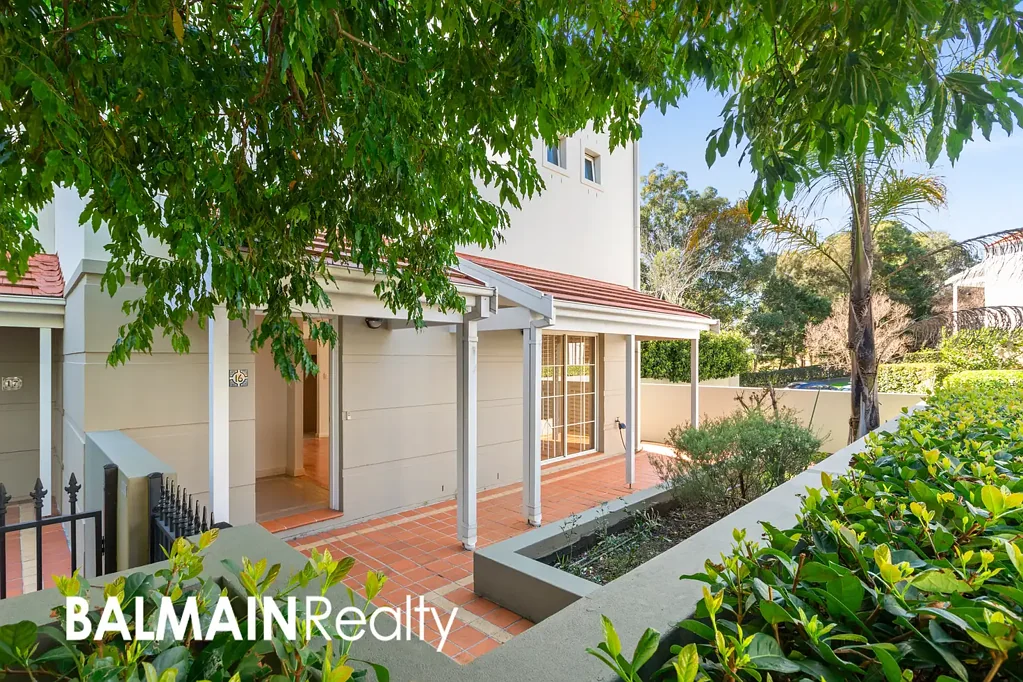 Townhouse with Wrap-Around Entertainers Courtyard and Double Lock Up Garage