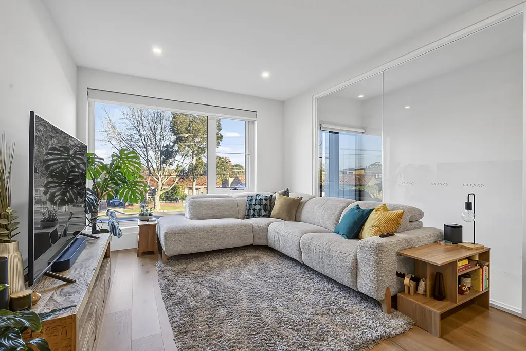 Architecturally Designed Tri-Level Townhouse with Expansive Rooftop Terrace
