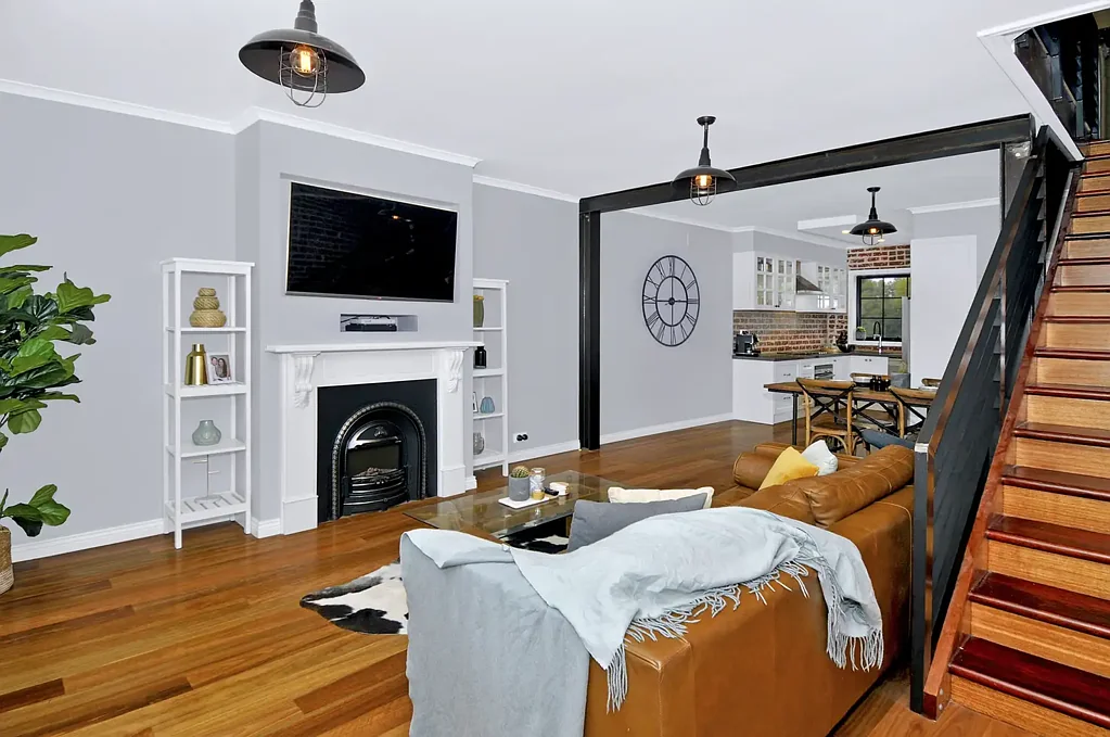 LOW MAINTENANCE LIVING WITHIN A STUNNING RENOVATION