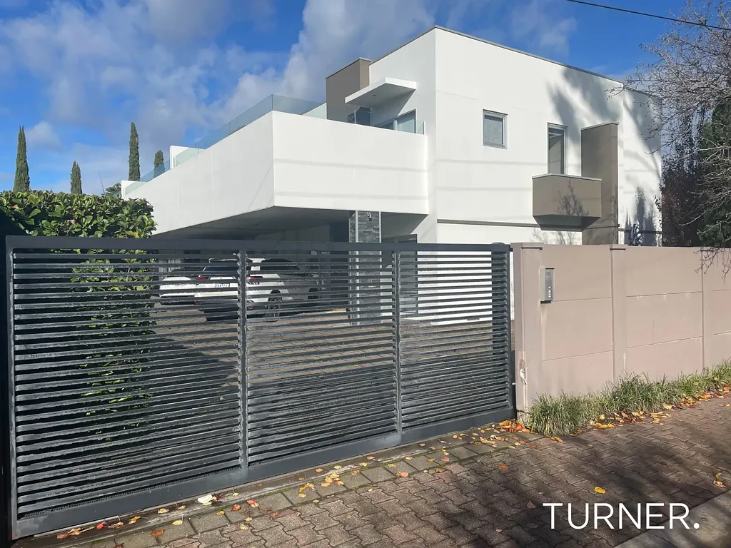 Stylish Three-Bedroom Townhome with Flexible Living and Secure Parking