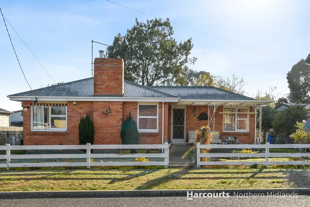 Longford 2 Bedroom Charming Two-Bedroom Home with Sunroom and Ample Potential