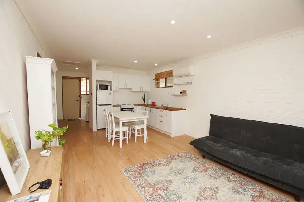 RENOVATED UNIT WITH LEVEL WALK TO THE BEACH