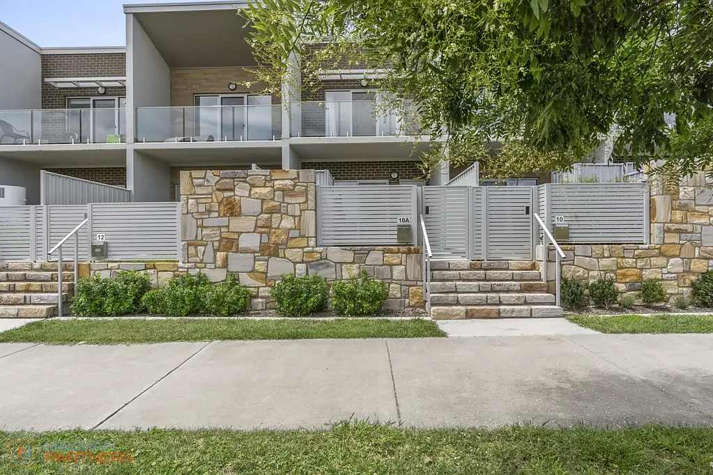 A rare three bedroom, 2.5 bathroom offering with water views in the heart of Molonglo.