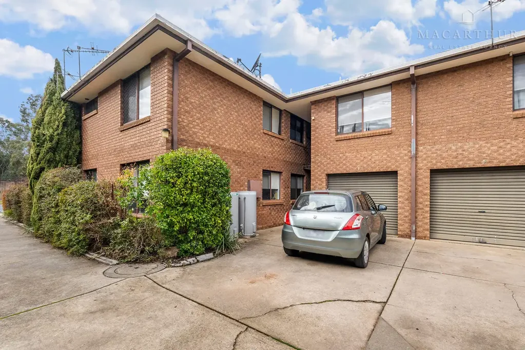 Spacious Top-Floor Unit in the Heart of Town
