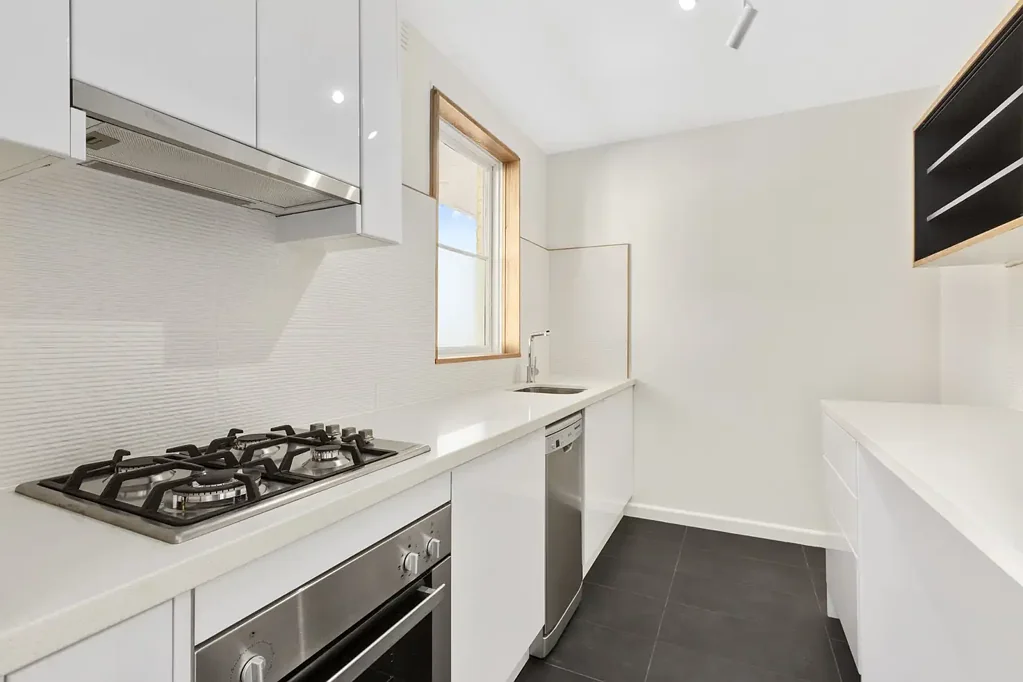 SUN-FILLED & SPACIOUS WITH A STYLISH RENOVATION