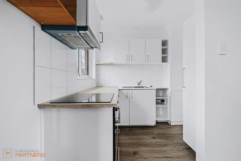 Top-Floor Unit with Leafy Views in Prime Curtin Location