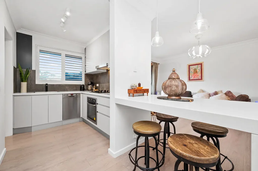 Elegant Living in a Serene Oasis with a bonus Double Lock up Garage