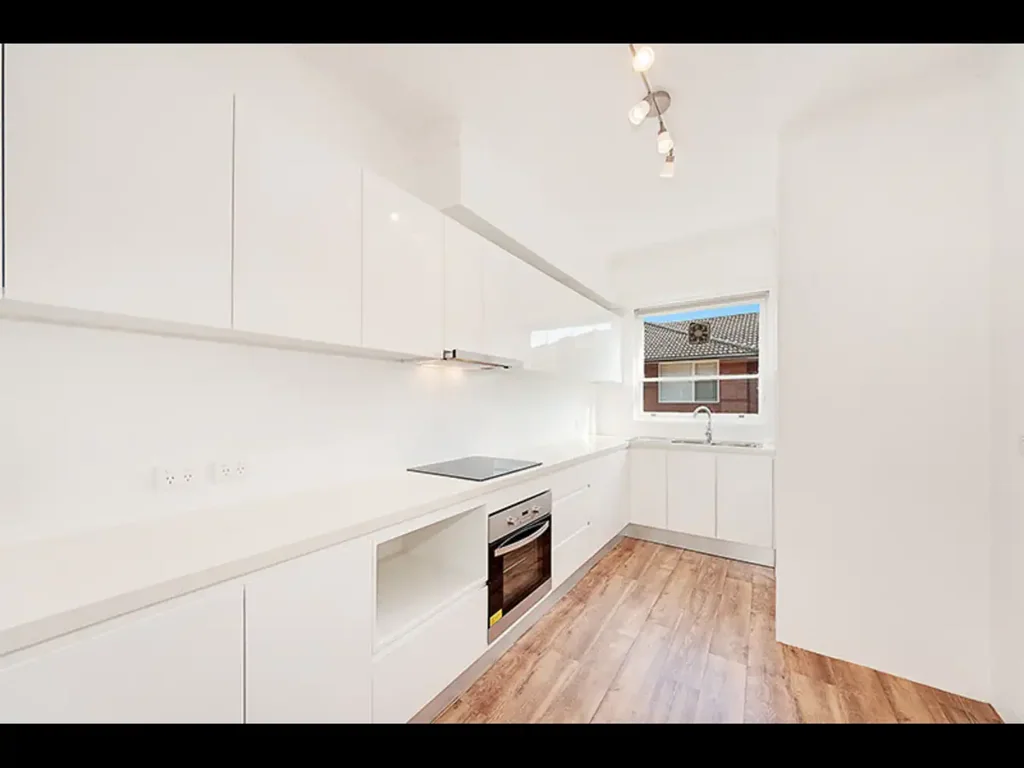 East Facing Spacious Unit Located Minutes Walk from the Beach.