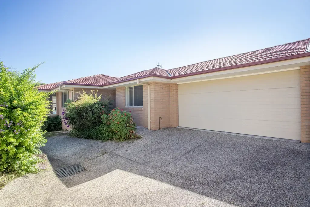 Charming Three-Bedroom Family Villa with Private Back Yard