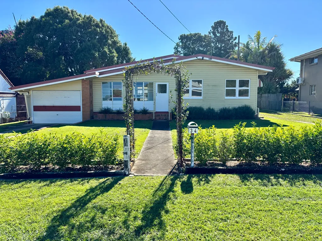 Conveniently Located Spacious 2 Bedroom Home with massive Shed