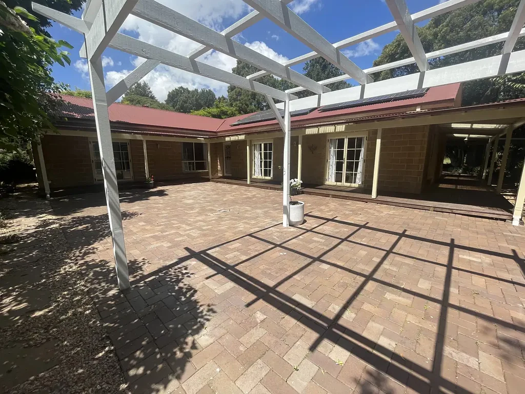 EXECUTIVE RESIDENCE SET IN APPROX 2.4AC ESTABLISHED GARDENS