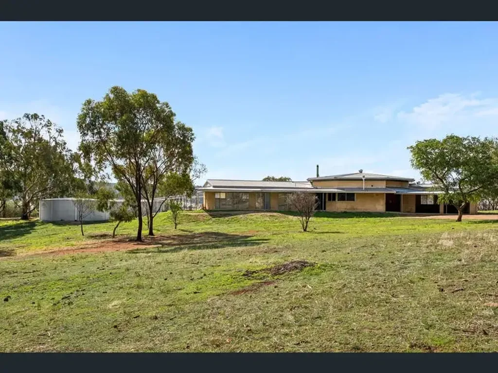 Spacious House on a Large Block with Sheds