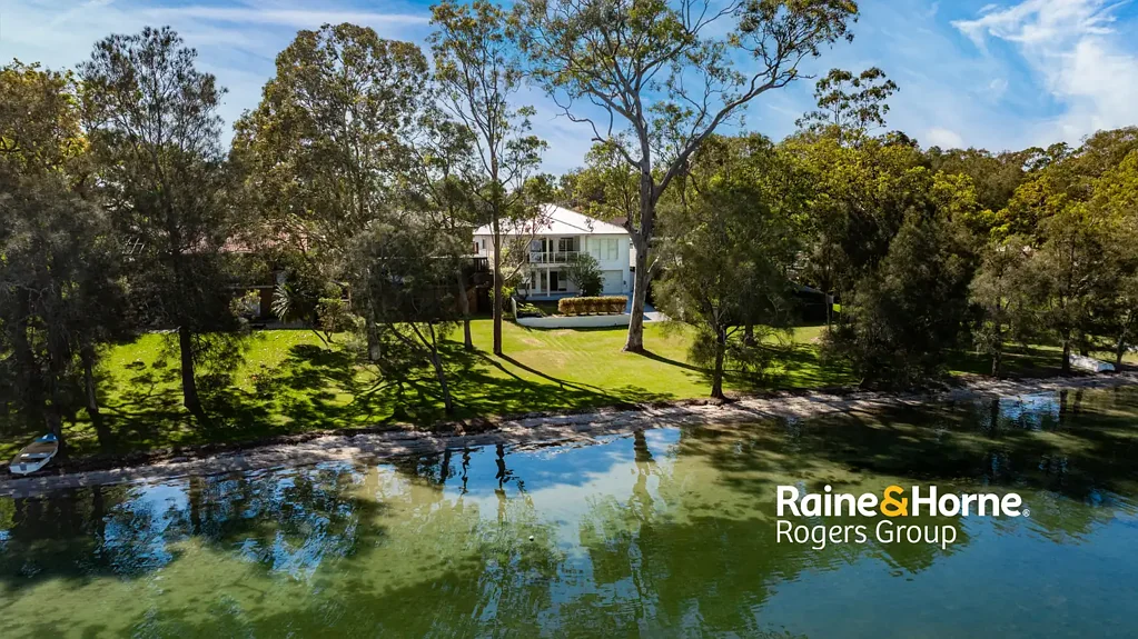 Summerland Point 6Moenga Waterfront Elegance Meets Dual Family Living