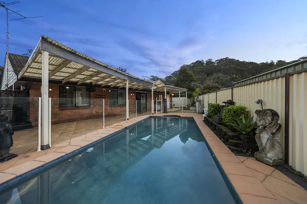 Woronora 4 Slaapkamer A Tranquil Escape with Family Appeal