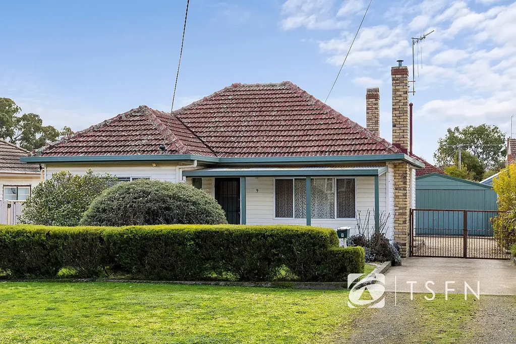 Charming Three-Bedroom Home with Shed and Side Access