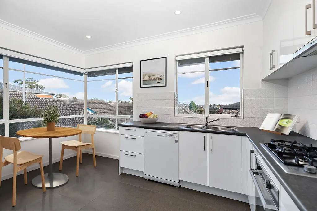 Renovated Three-Bedroom Townhouse with Double Garage & Private Courtyard