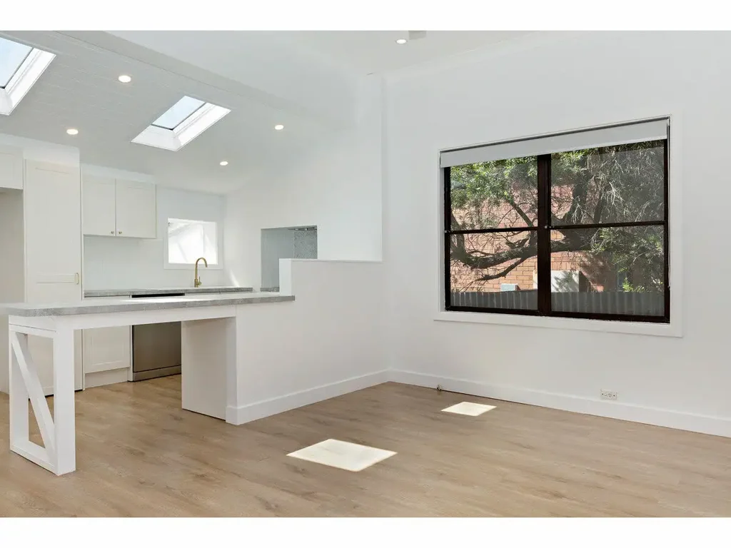 MODERN RENOVATED RETREAT WITH HIGH CEILINGS & DOUBLE CARPORT