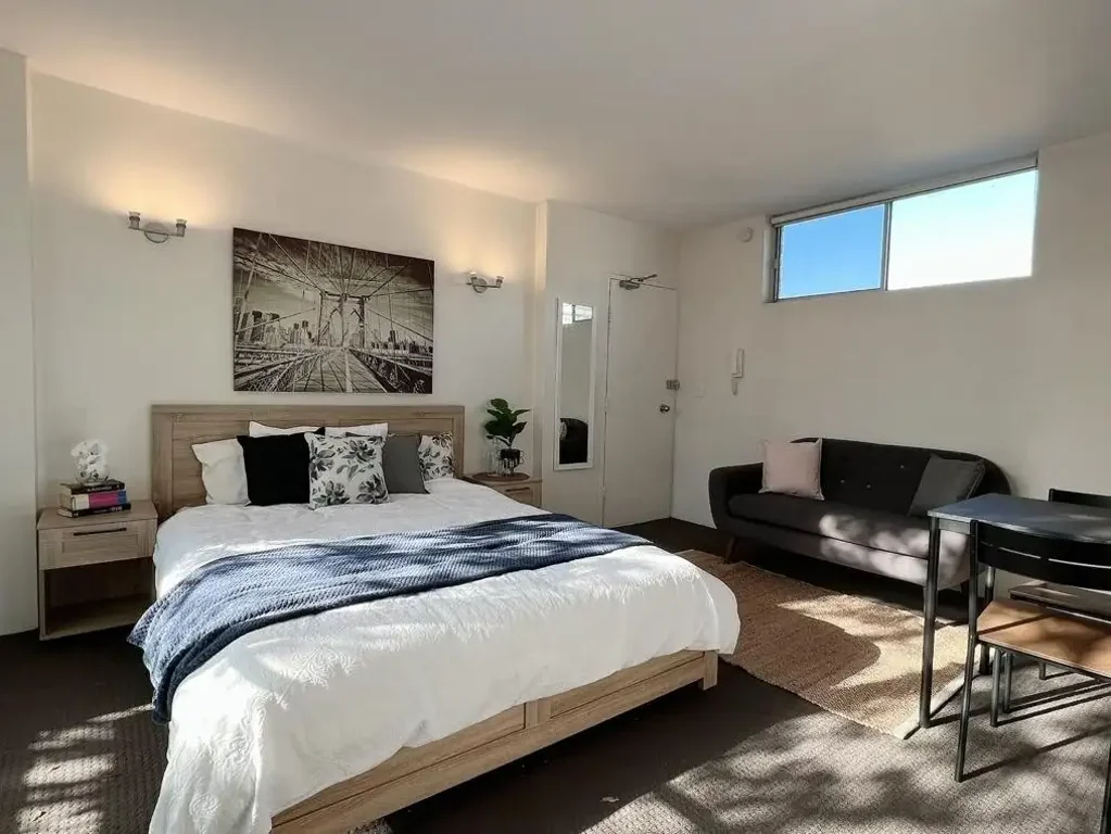 Top floor, balcony & sunny fully furnished studio apartment