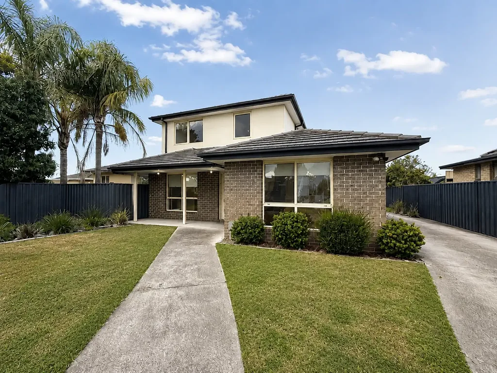 Near New & Bursting with Natural Light!