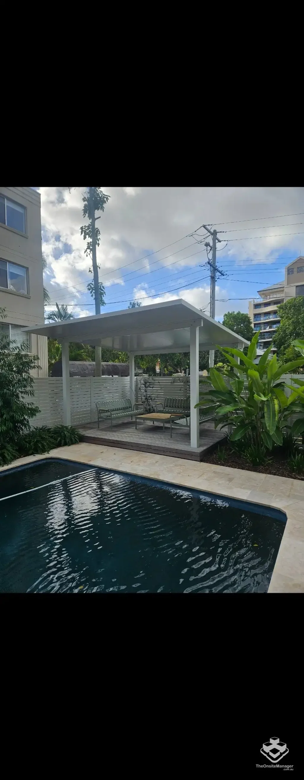 FULLY FURNISHED Apartment with undercover entertaining deck overlooking the pool and glimpses of the river.