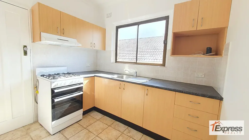 TWO BEDROOM TOP FLOOR APARTMENT