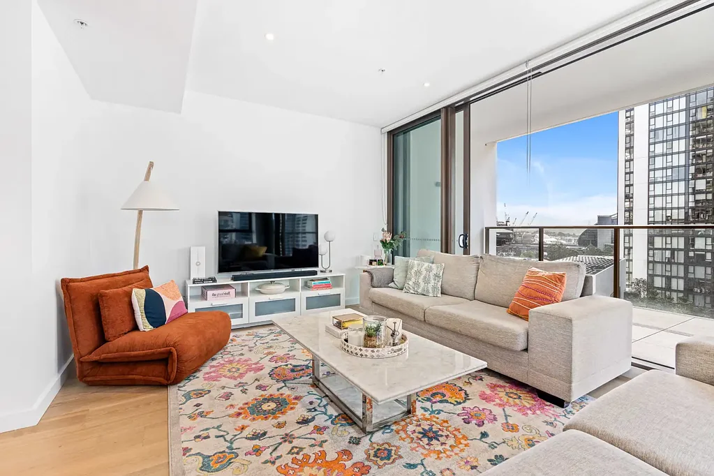 PERFECTLY POSITIONED NORTH FACING TWO BED TWO BATH APARTMENT WITH CAR SPACE
