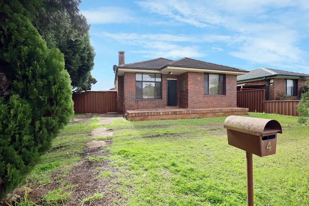 Charming Single-Level Brick Home on Corner Block