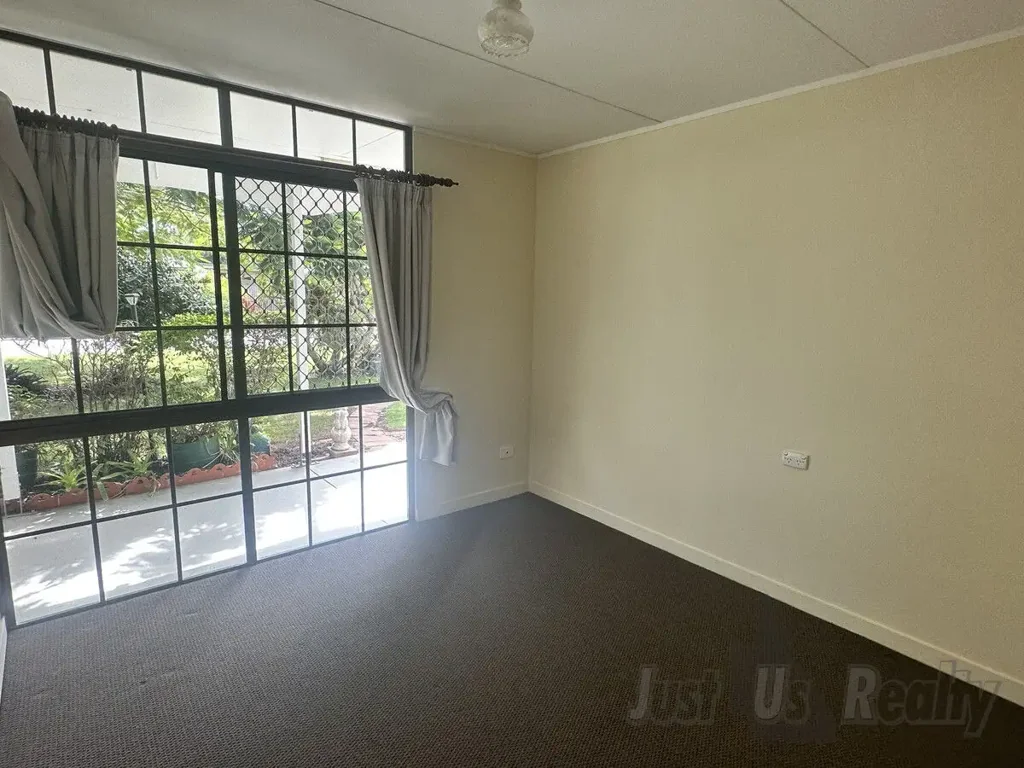 Beachside Family Living with Spacious Backyard and Modern Comforts