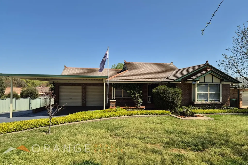 Spacious Four-Bedroom Home with Exceptional Parking Space!