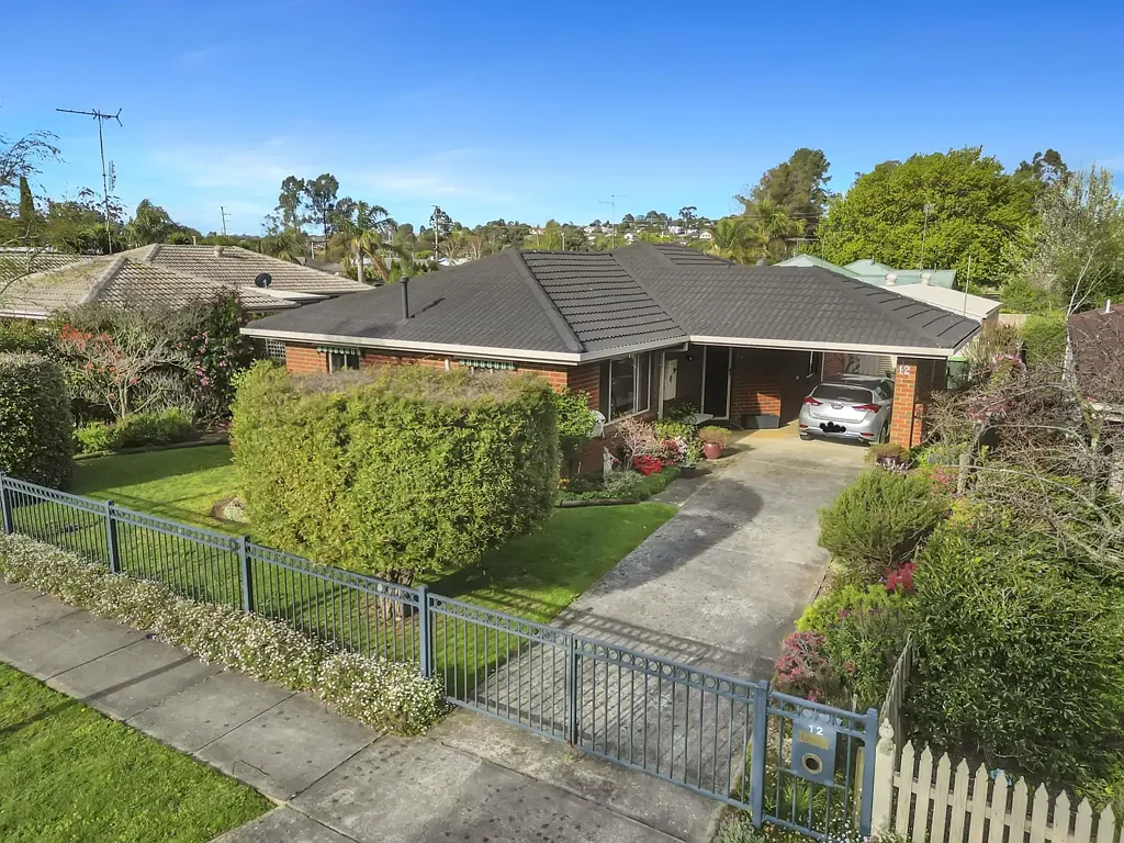 Beautifully Maintained Home With Established Gardens - Close to Town