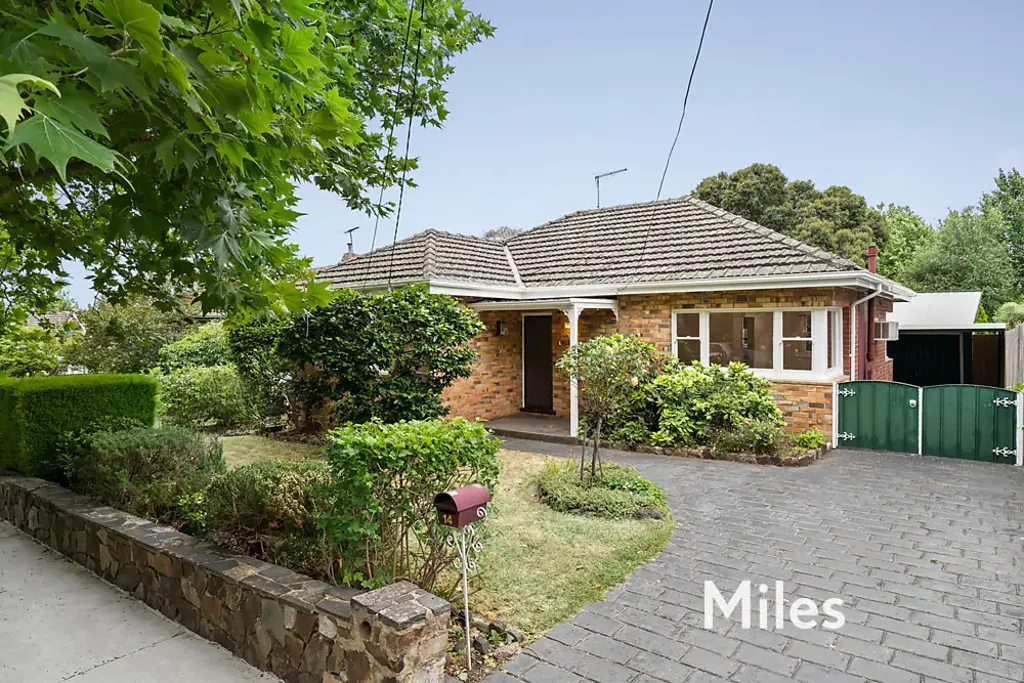 A PRETTY CLINKER BRICK HOME