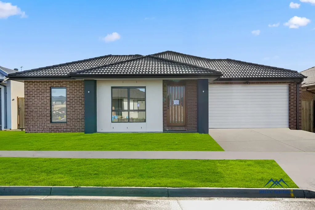 Bright, Modern and Move- In Ready-  Family Living at its Best !