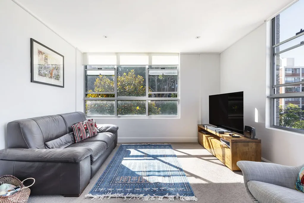 Modern apartment wrapped in big windows, long views