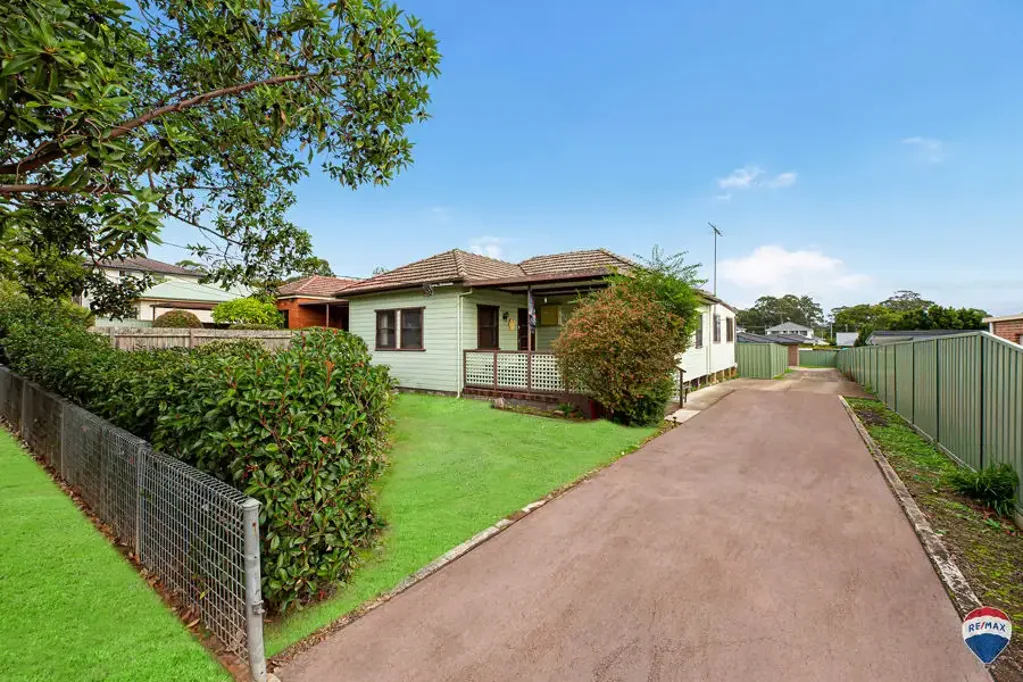For rent is a three-bedroom home with generous living spaces and a large backyard.